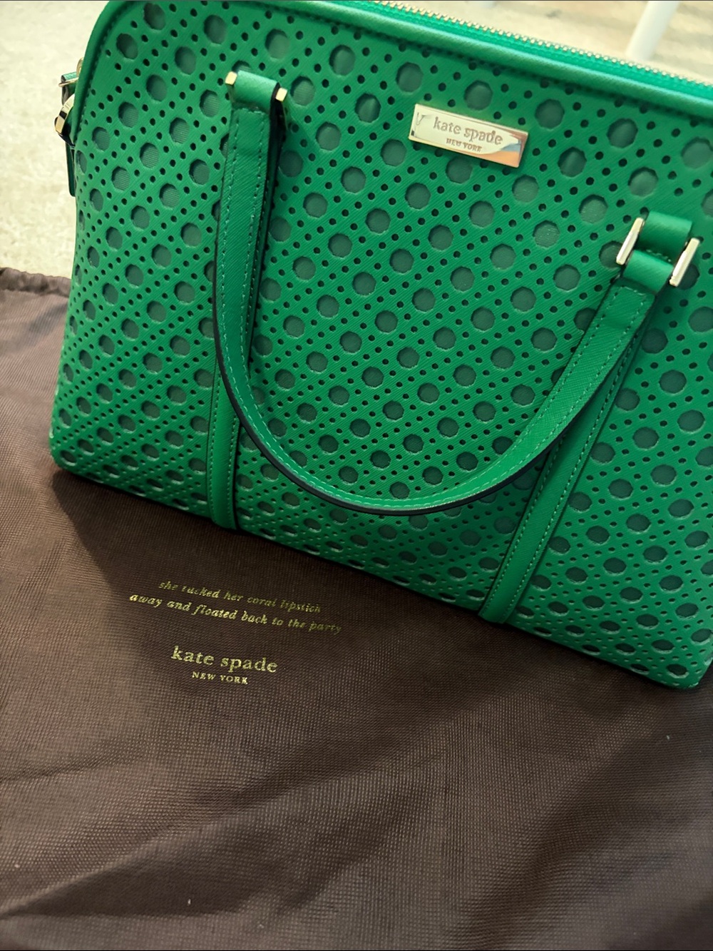 kate spade green perforated satchel with gold plaque
